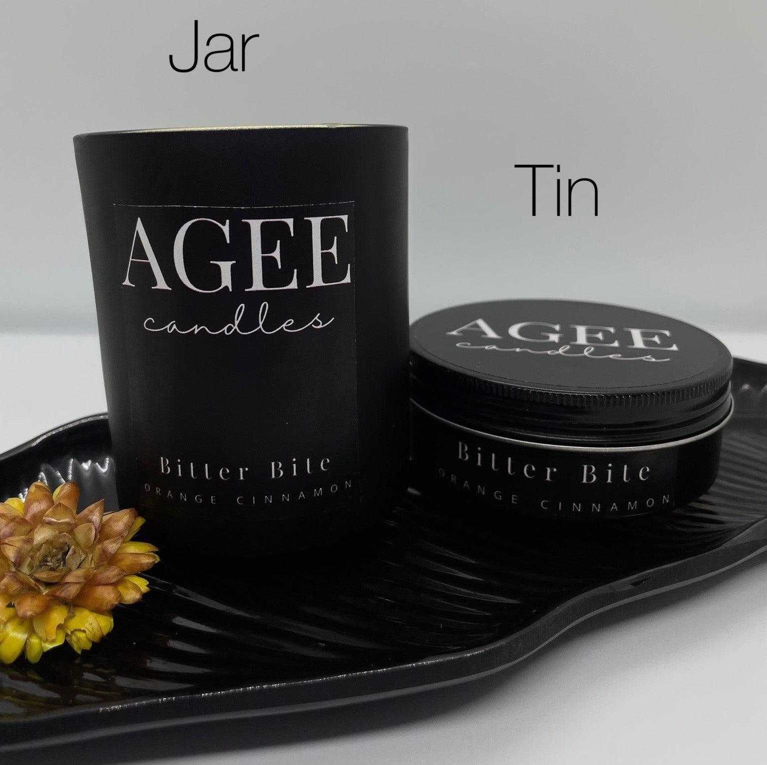 orange cinnamon scented candle jar and tin